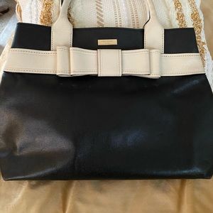 Kate Spade. Alice Court Diel. Cream Black Bow